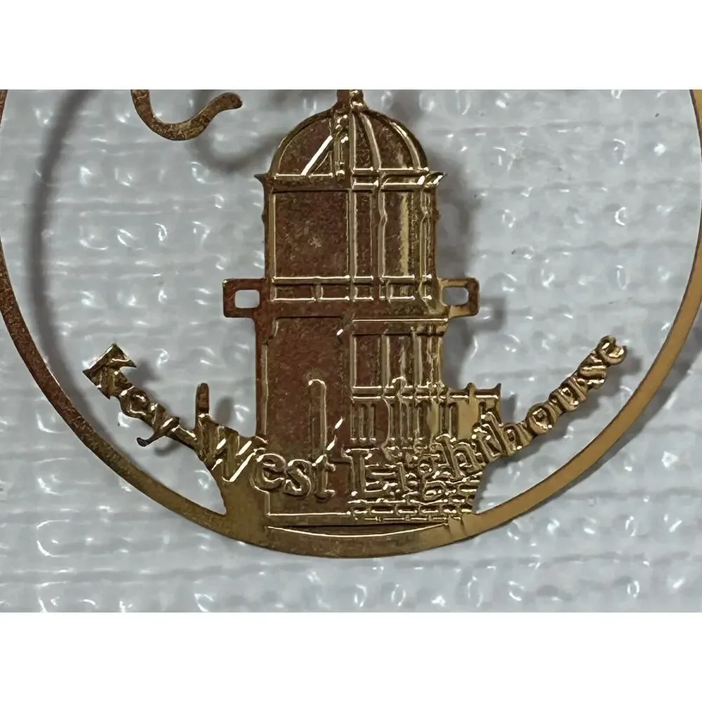2” Merry Christmas Key West Lighthouse Gold Tone Christmas Tree Ornament Vintage